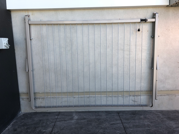 Austral Balcony Line Clothesline folded flat against the wall